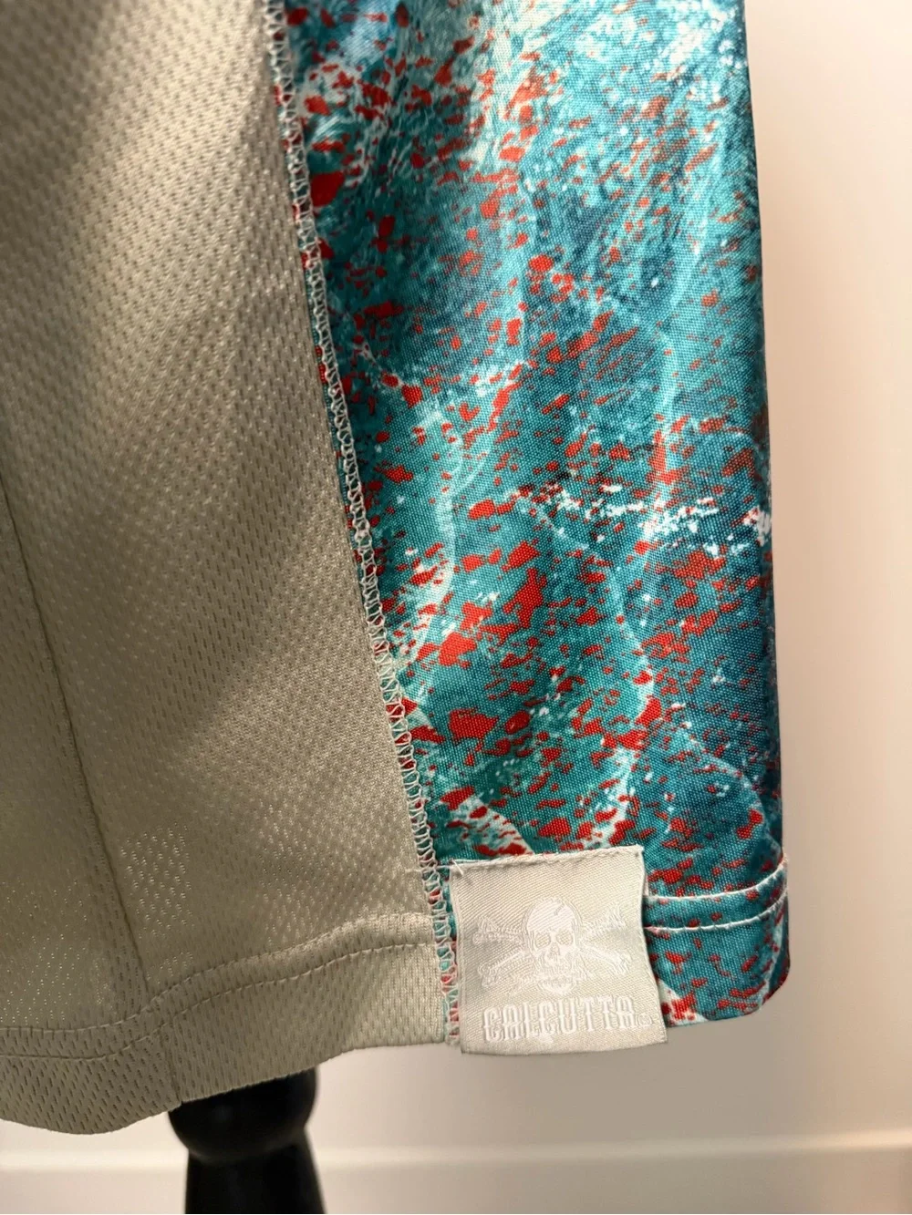Coastal Performance Hoodie in Teal & Coral by Calcutta